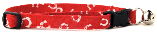 Tiny horseshoes tossed on red Cat Collar